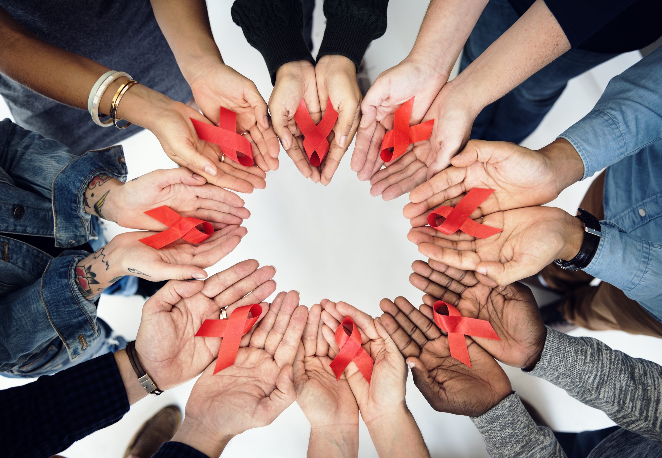 Group,Of,Hands,Holding,Red,Ribbon,Stop,Drugs,And,Hiv/aids
